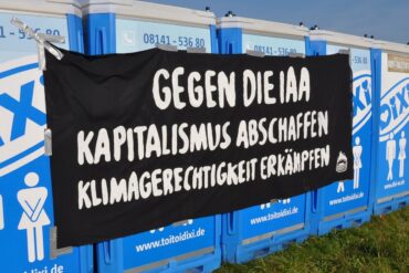 Transparent příznivců nerůstu v Německu