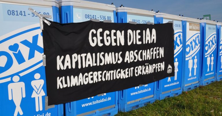 Transparent příznivců nerůstu v Německu