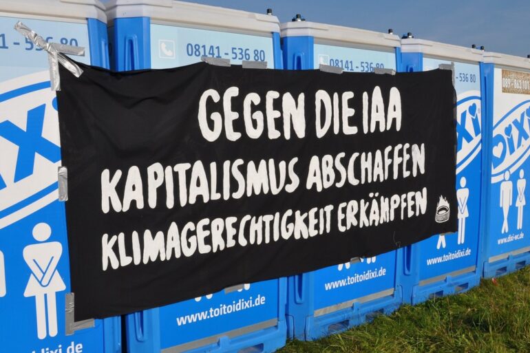 Transparent příznivců nerůstu v Německu